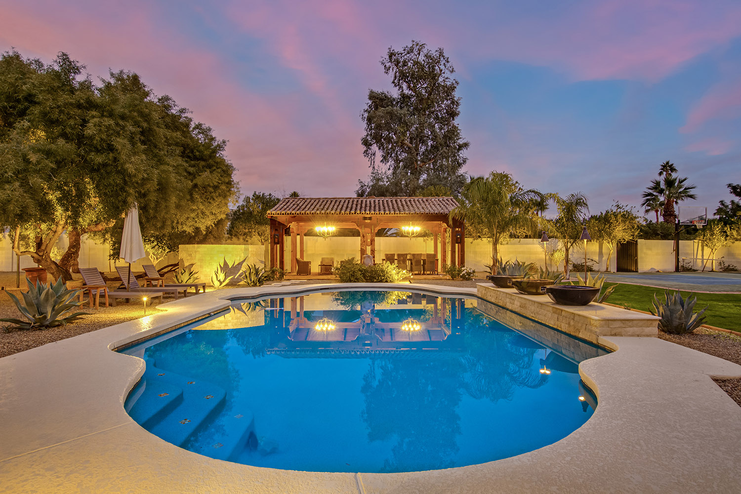 Scottsdale luxury vacation home with pool at night